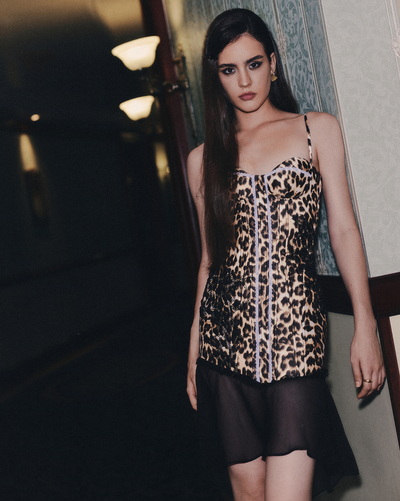 The Wardrobe leopard corset dress campaign portrait